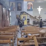 Pelo menos 20 pessoas morreram e 52 ficaram feridas após um atentado suicida dentro da Igreja Mar Elias, localizada na capital da Síria. Foto: Captura de tela/YouTube/Telly Guru