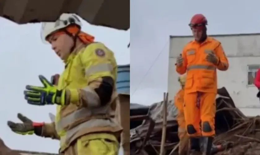 Bombeiros fazem oração antes de iniciar buscas por duas crianças soterradas após forte deslizamento em Juiz de Fora (MG). Foto: Reprodução/Instagram/Rádio Itatiaia