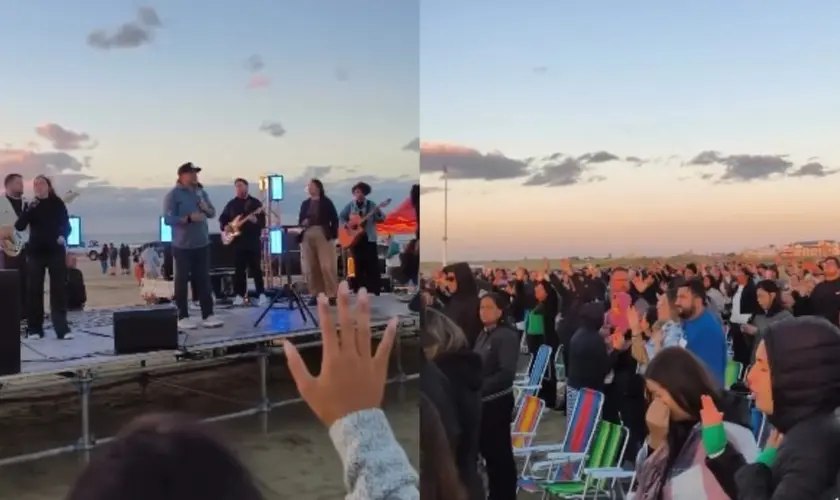 Culto em praia reúne multidão ao amanhecer no RS, com louvor, oração e pessoas entregando suas vidas a Jesus. Foto: Reprodução/Instagram/Sara Gomes Ribeiro